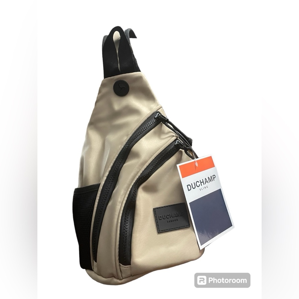 Duchamp Sling Bag NWT Tan with black.